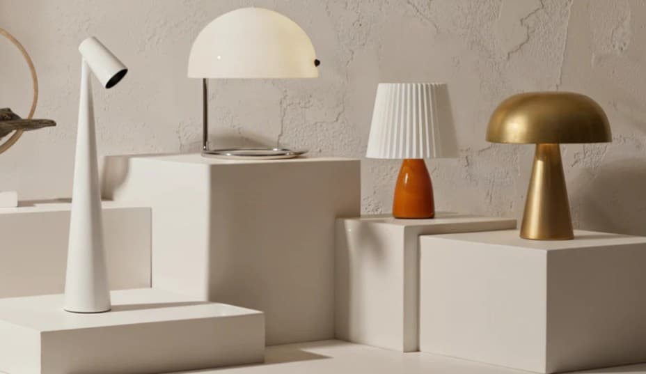 A corner with an eclectic mix of different lamp styles