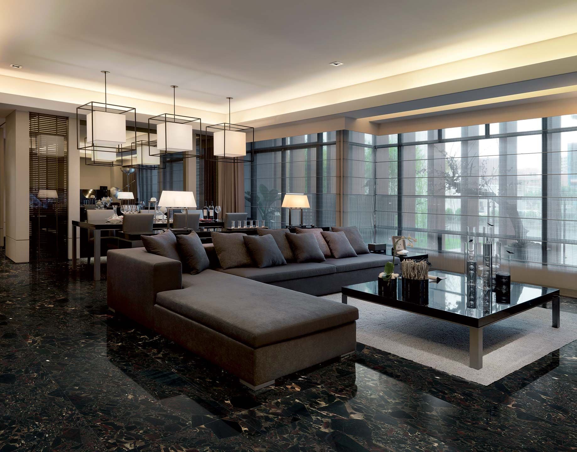 A sleek modern interior with sharp-edged black furniture and a polished marble floor