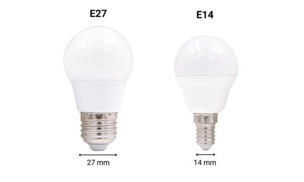 Two light bulbs side by side showing the difference between an E27 large screw base and an E14 small screw base