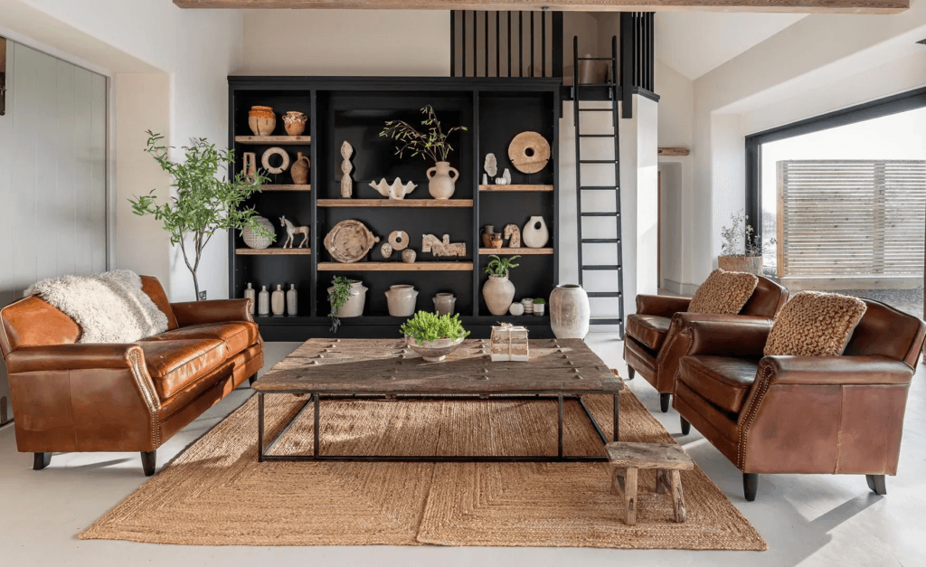 A display of rustic wooden home accents and cultural decor pieces